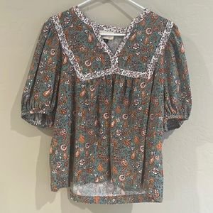 Cute popover shirt in great colors, blousy shape and elastic armholes